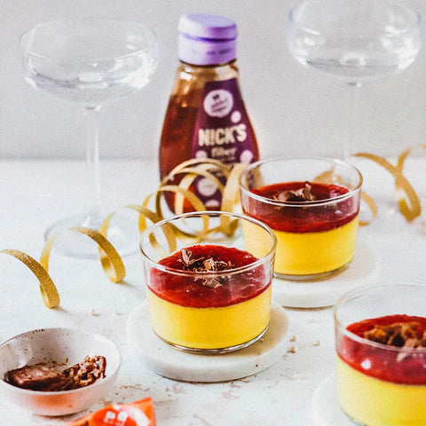 Christmas pannacotta with saffron, chocolate and raspberry.